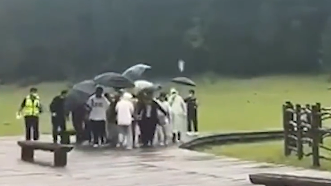 The bride and groom were having a pre-wedding photo shoot at Jade Dragon Snow Mountain in China when lightning struck and killed the groom, authorities said.