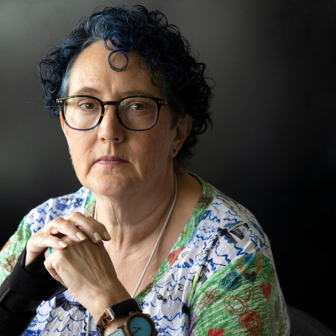 Laura Leigh Rampey, a veteran MAST Academy advanced math teacher in Miami-Dade County Public Schools, is concerned the new Florida education laws will stifle academic freedom, particularly among younger teachers. Gov. Ron DeSantis signed bills in the spring that restrict what teachers can teach about certain subjects and give parents the power to sue the school district. Rampey was photographed at MAST on Thursday as she prepared for Wednesday’s start of classes.