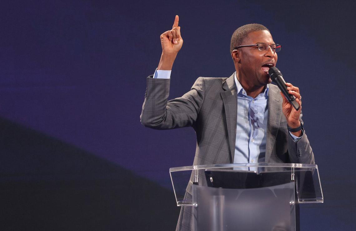 Pastor Gregory Toussaint of Tabernacle of Glory addresses the congregation during Sunday service at a new north Miami-Dade location.