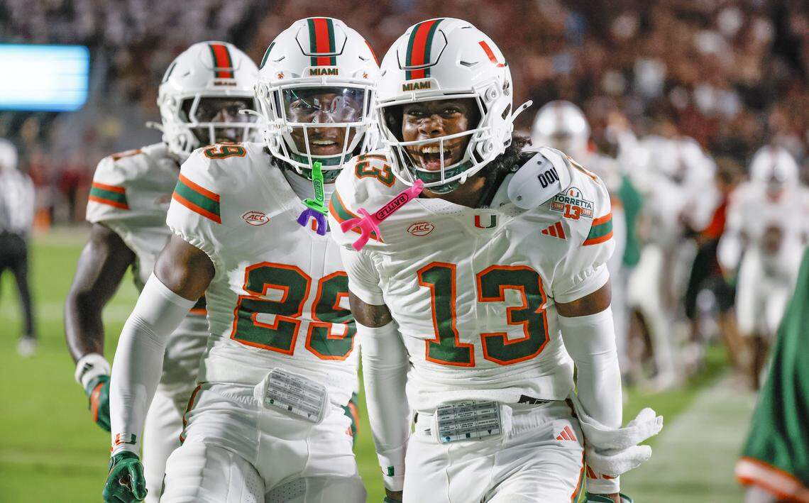 Miami Hurricanes defensive back Bryce Fitzgerald (13) celebrates after intercepting a pass in the first half of the NCAA game against the Florida State Seminoles at Doak Campbell Stadium in Tallahassee, Florida, on Saturday, October 4, 2025.