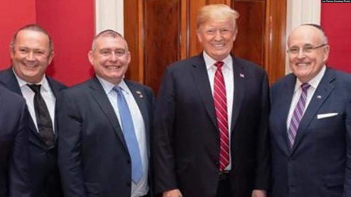 From left to right: Igor Fruman, Lev Parnas, President Donald Trump and Rudy Giuliani.
