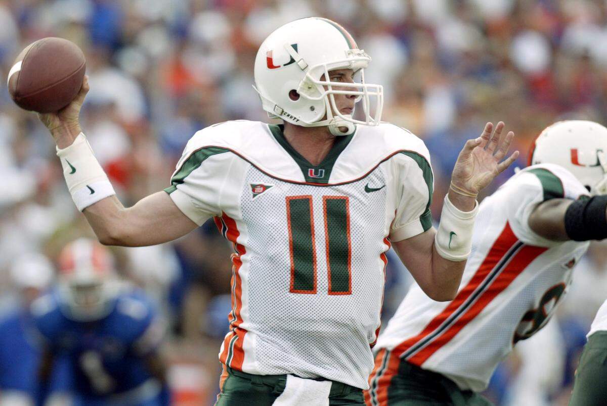 Miami quarterback Ken Dorsey (11) fires a pass during the first half of their 41-16 win over Florida in Gainesville, Fla., in this Sept, 7, 2002 photo.