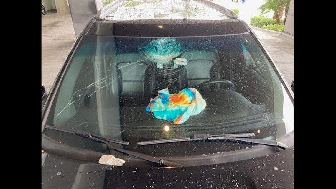 The roof of the Opal Sands in Clearwater, Florida, was struck by lightning, sending debris into the parking lot below.