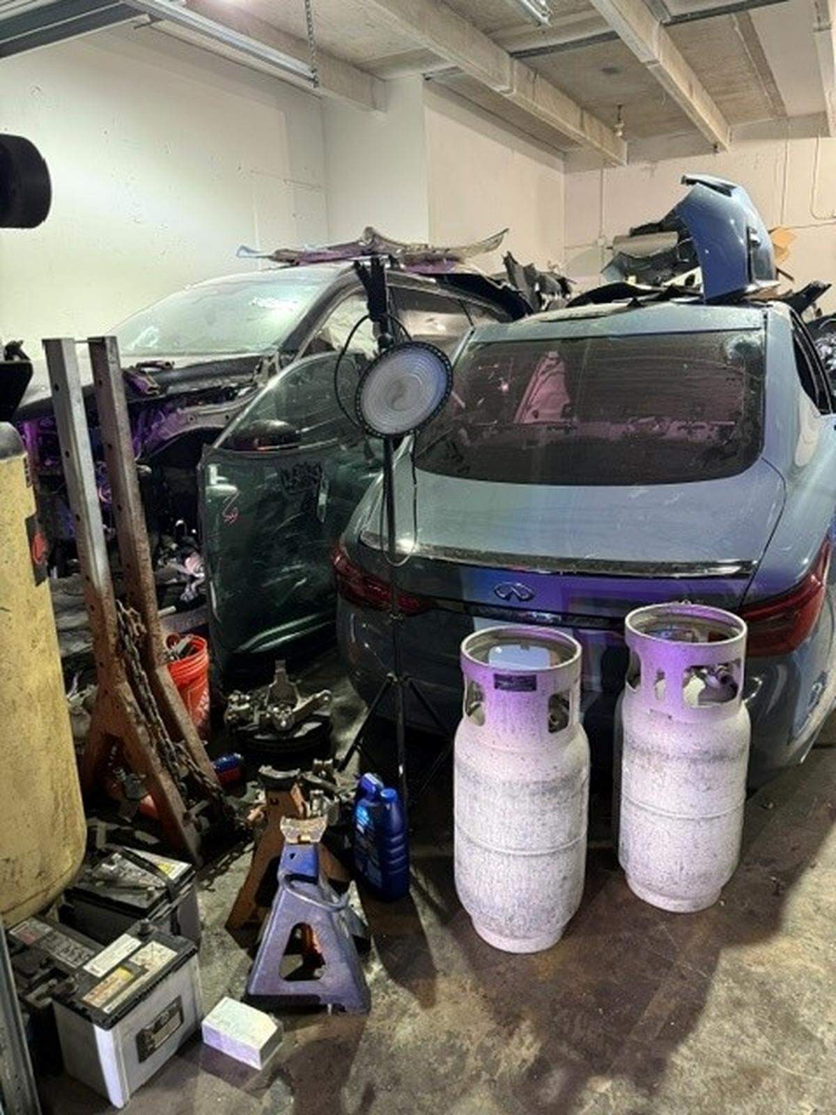 A GPS tracker helped Medley police locate a warehouse at 7450 Northwest 74th Avenue where stolen Infinitis were dismantled and a suspect was arrested.
