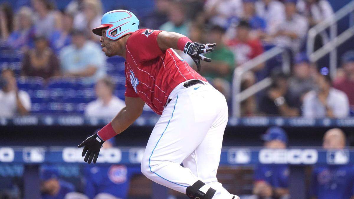 Miami Marlins’ Jesus Aguilar runs after hitting a single during the first inning of a baseball game against the Chicago Cubs, Sunday, Aug. 15, 2021, in Miami. (AP Photo/Lynne Sladky)