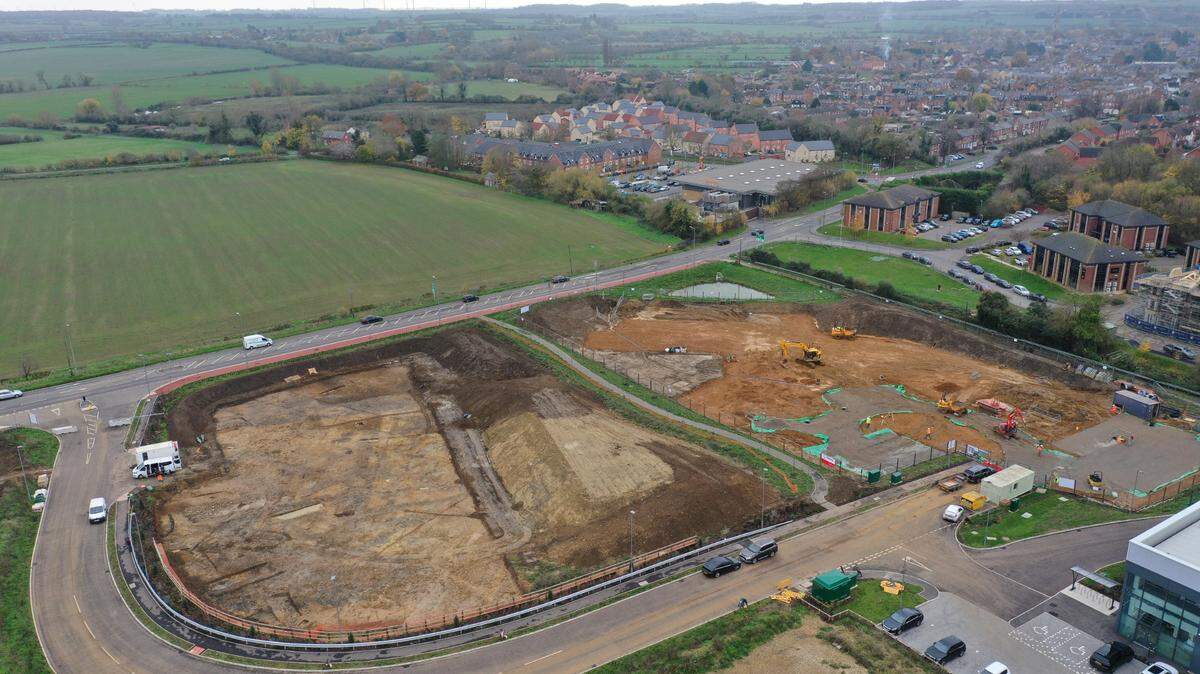 Archaeologists in Olney found ruins of a Roman building with a colorful mosaic during construction for an Aldi grocery store, photos show.