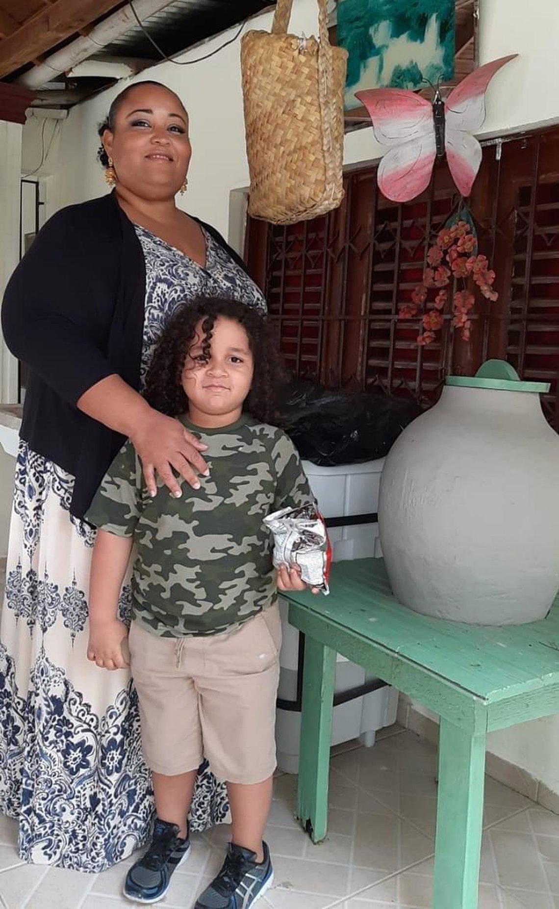 A family picture of Rosa Felipe with son Ishaan Marte. She is a Jackson Hospital healthcare worker who was one of the first to contract COVID-19 and remains in the hospital.