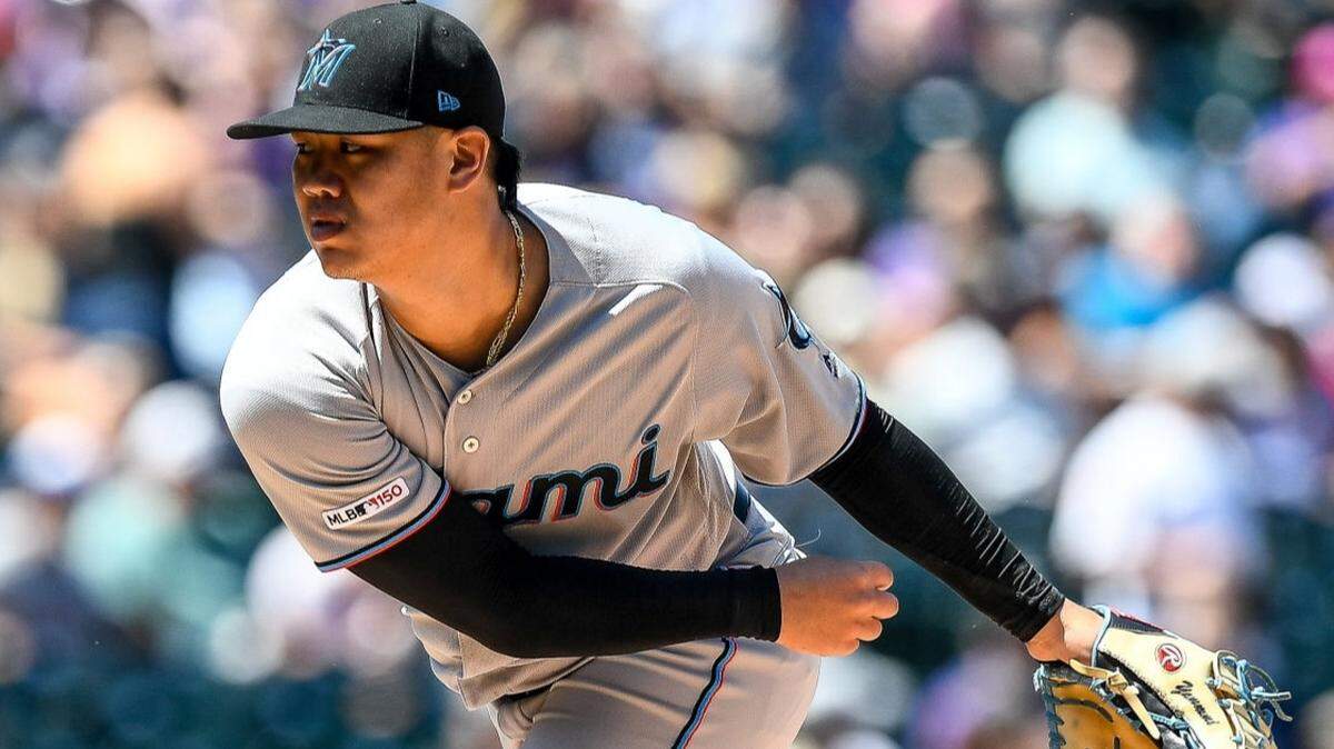 The Miami Marlins’ Jordan Yamamoto pitches against the Colorado Rockies at Coors Field on Sunday, Aug. 18, 2019, in Denver, Colorado.