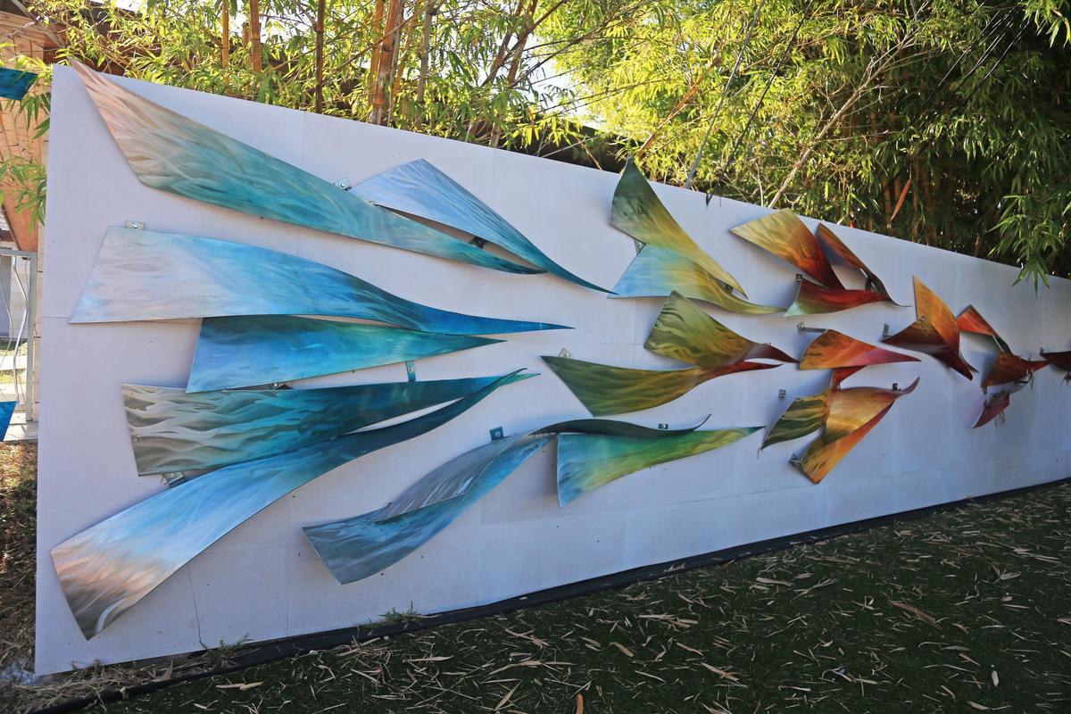 A section of the artwork decorating the outside wall of a house at 5101 Pine Tree Dr. in Miami Beach.