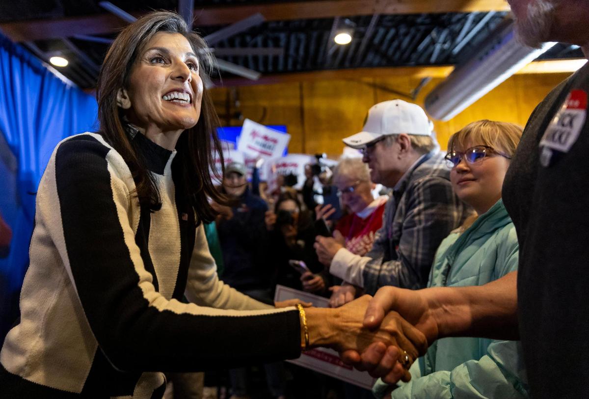 Former United Nations Ambassador Nikki Haley greets supporters during a rally at Jethro’s BBQ on Sunday, Jan. 14, 2024, in Ames, Iowa. A poll released Saturday showed Haley running in second place ahead of the Iowa caucuses.