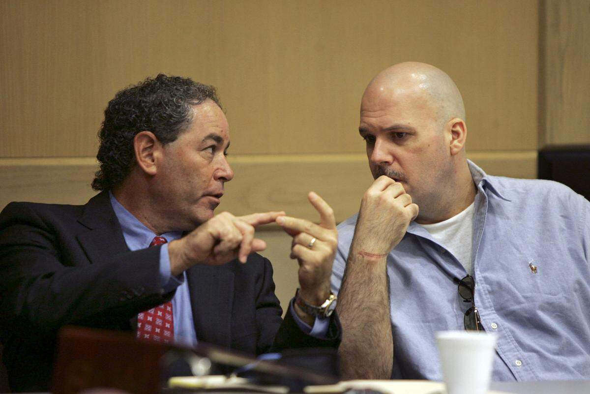 FILE - Defense attorney Mitchell Polay talks with Howard Steven Ault on Aug. 13, 2007 during opening arguments in Ault’s sentencing phase.