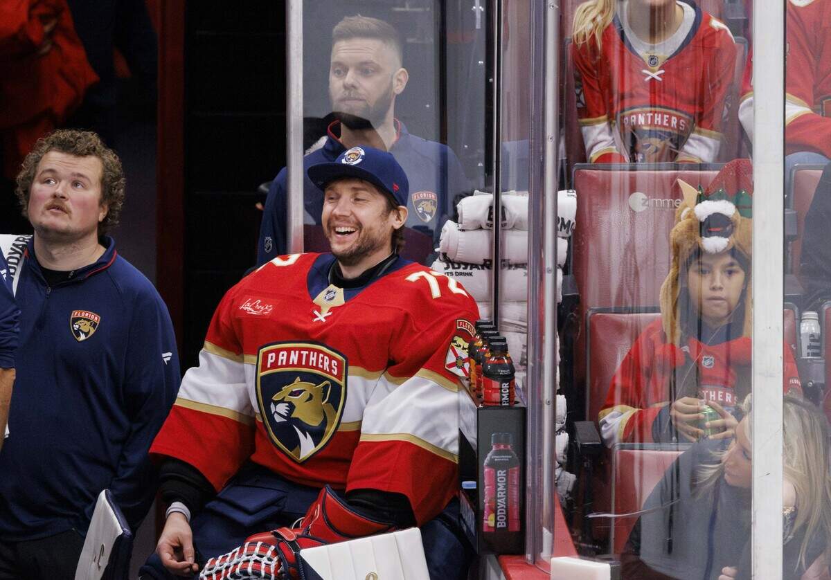 Florida Panthers goaltender Sergei Bobrovsky (72) smiles after Florida Panthers goaltender Daniil Tarasov (40) stopped a shot on goalduring the second period of a game against the Los Angeles Kings on Wednesday, Dec. 17, 2025, at Amerant Bank Arena in Sunrise, Fla.