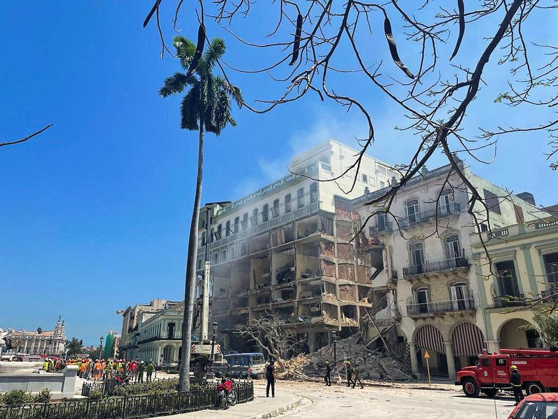 Rescue teams work at a site after an explosion destroyed the Hotel Saratoga, in Havana, Cuba, on May 6, 2022.