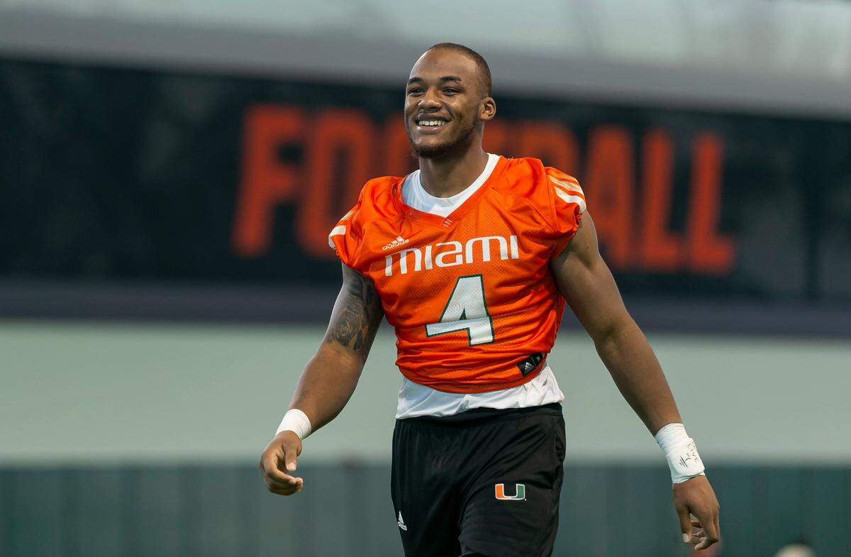 Miami Hurricanes running back Jaylan Knighton (4) talks during a press conference at the University of Miami on Monday, Aug. 8, 2022, in Coral Gables, Fla.