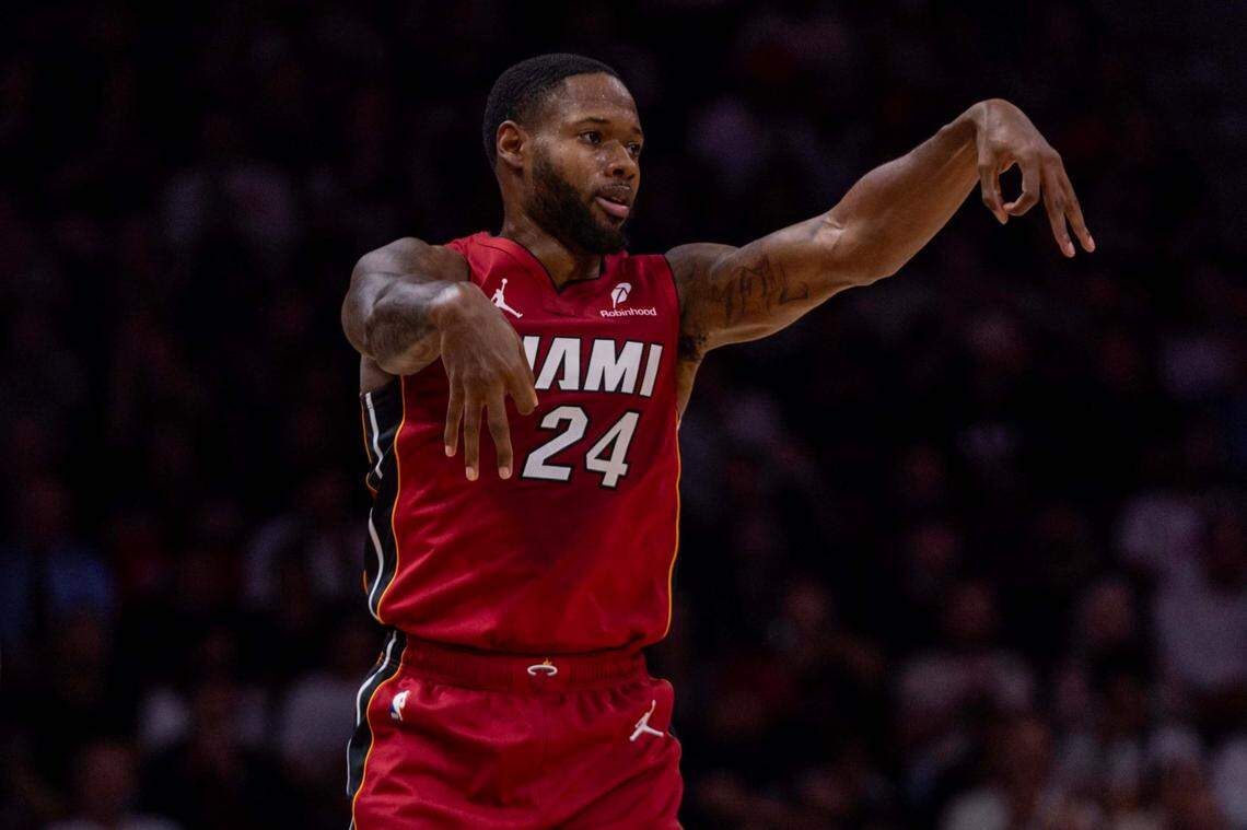 Miami Heat forward Haywood Highsmith (24) reacts to hitting a three during the first half of an NBA game against the Atlanta Hawks on February 26, 2025, in Miami.