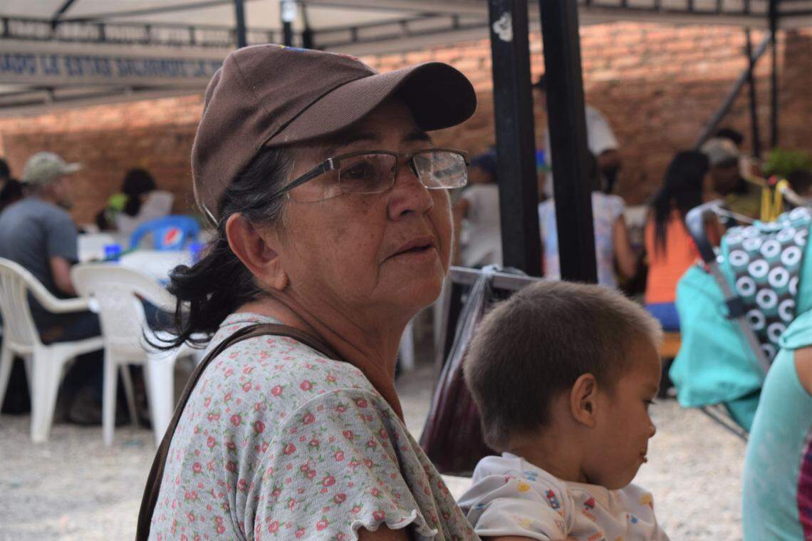 Evelia Carrero, 76, and her two-year-old grandson, Jesus, traveled 10 hours from Venezuela to Cucuta, Colombia, in hopes of finding affordable food. In Cucuta, Carrero and three of her grandchildren ate at a free food kitchen run by the Catholic Church and financed, in part, by the U.S. government.