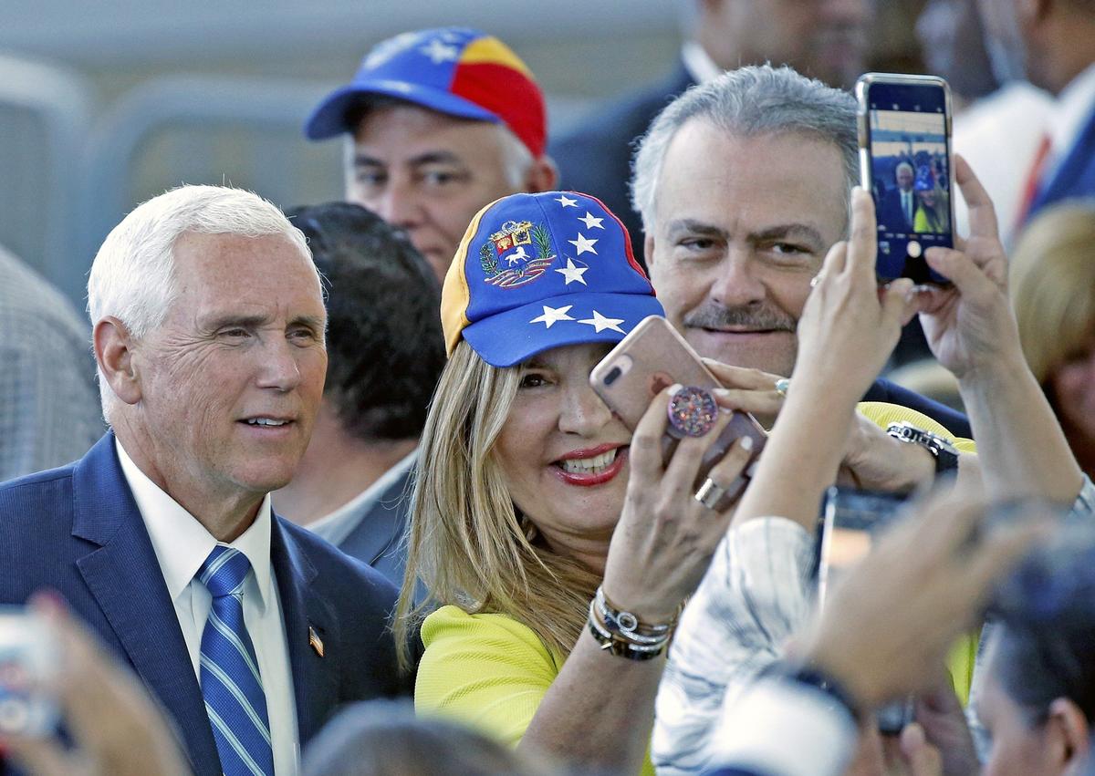 Vice President Mike Pence poses with Pastor Paula Tenreiro after visiting the U.S. Navy hospital ship USNS Comfort at PortMiami on Tuesday, June 18, 2019. The ship will depart Miami June 18 to begin a five-month medical assistance mission with scheduled stops in Colombia, Costa Rica, Dominican Republic, Ecuador, Grenada, Haiti, Jamaica, Panama, Saint Lucia, and St. Kitts and Nevis.