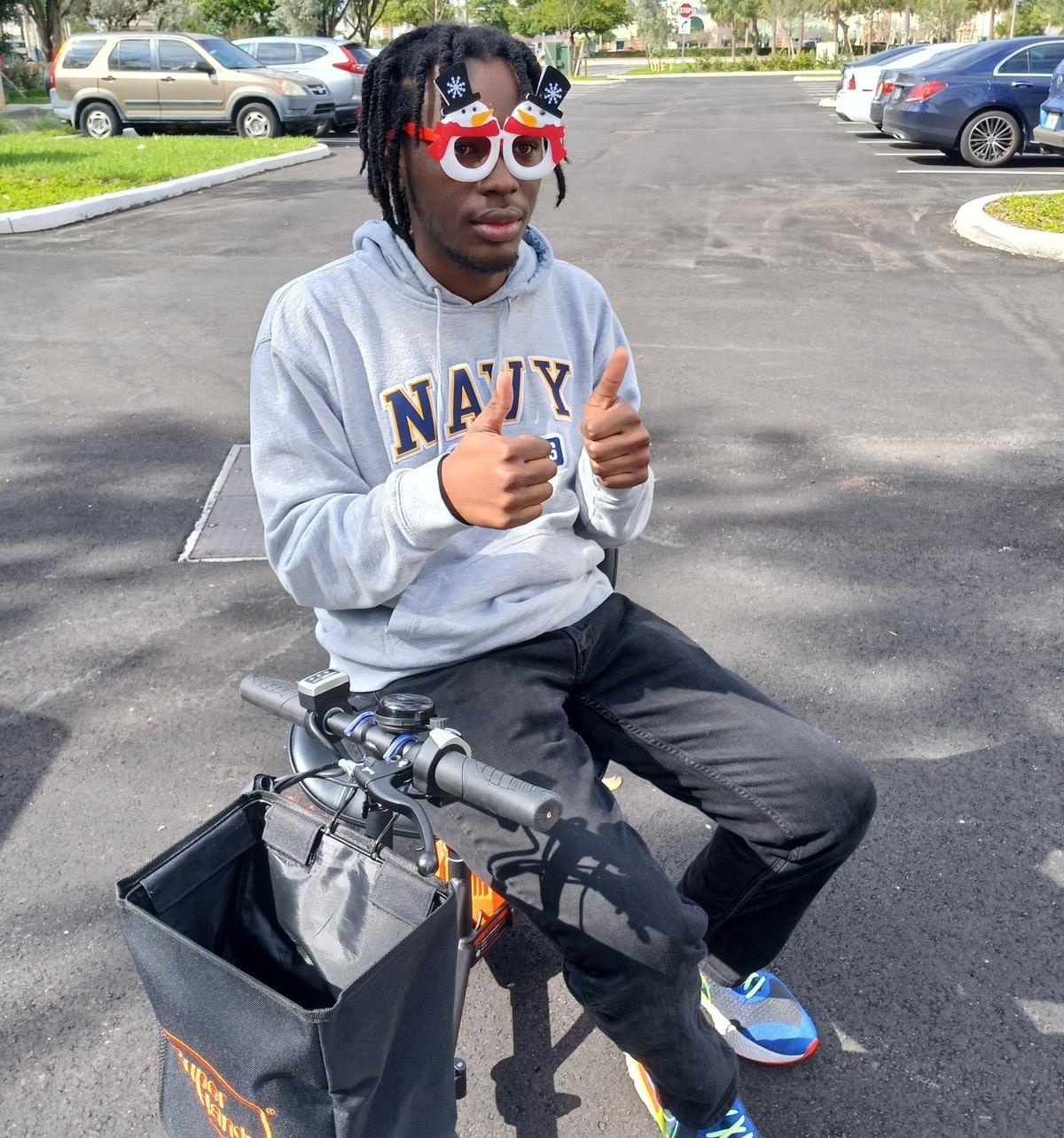 Deryan Deal, a 19-year-old engineering student at the University of Central Florida and Florida International University, received an unexpected gift of a scooter over the 2024 holidays from Wish Book donor Bernhard Lukoschek of Miramar. He read a Miami Herald Wish Book story of another person who needed a scooter. When his gift didn’t work for that person (and she received a scooter from another donor) Lukoschek told the Multiple Sclerosis Foundation he’d gladly give his scooter to someone at the charity who could use one.