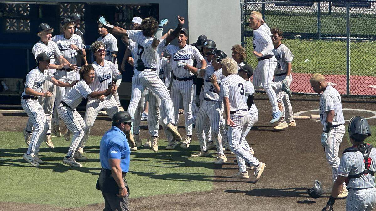 West Broward’s AJ Cruz leaps into the air to celebrate with his teammates following a home run in Saturday’s 13-7 win against Columbus in a Region 4-7A semifinal.