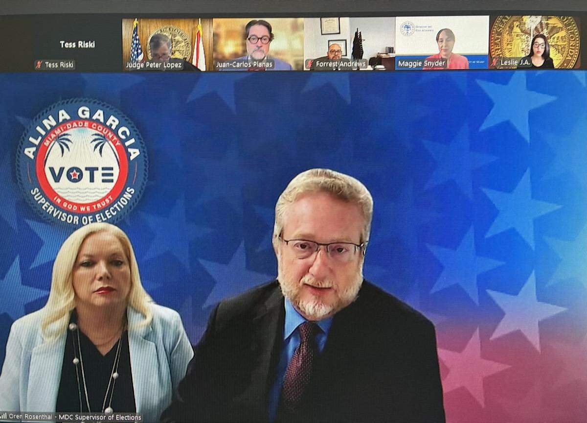 Miami-Dade Elections Supervisor Alina Garcia, left, appears with attorney Oren Rosenthal during a virtual hearing before Miami-Dade Circuit Court Judge Peter R. Lopez, on Nov. 10, 2025.