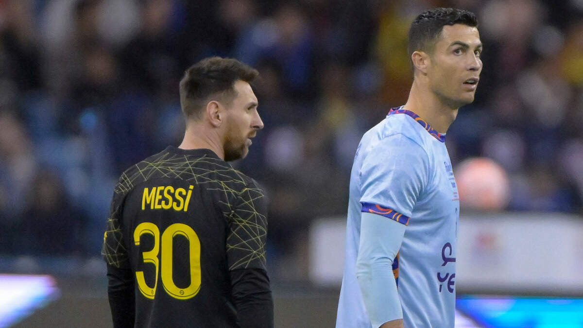 (230120) -- RIYADH, Jan. 20, 2023 (Xinhua) -- Paris Saint-Germain’s Lionel Messi (L) and Riyadh Season Team’s Cristiano Ronaldo react during the Riyadh Season Cup match between Riyadh Season Team and Paris Saint-Germain FC at King Fahd International Stadium in Riyadh, Saudi Arabia, on Jan. 19, 2023. (Photo by Khalid Abdulfaattah/Xinhua) (Photo by Xinhua/Sipa USA)