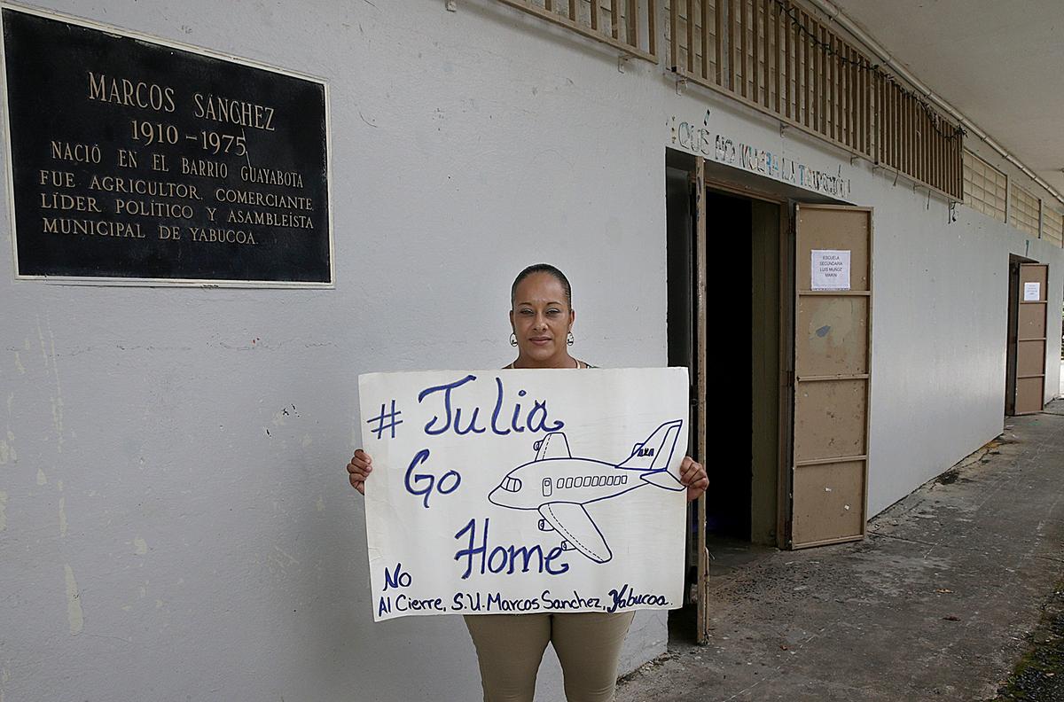 Outside a classroom at Marcos Sánchez K-8 Center, parent Alba Gómez protests Secretary of Education Julia Keleher’s decision to close the school after Hurricane Maria struck Puerto Rico.