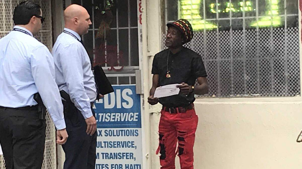 Miami-Dade detectives handed out fliers and tried to jog memories Friday, less than two weeks after three homeless people were shot in a pair of separate shootings within 48 hours. Two of them died, a third is critical.