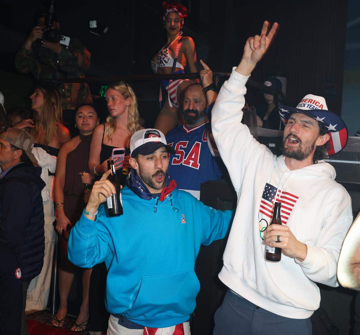 MIAMI, FLORIDA - FEBRUARY 23: Vincent Trocheck and Connor Hellebuyck attend a celebration of the USA Men's Hockey Team's Olympic Gold at E11EVEN Miami on February 23, 2026 in Miami, Florida.  (Photo by Alexander Tamargo/Getty Images for E11EVEN Miami)