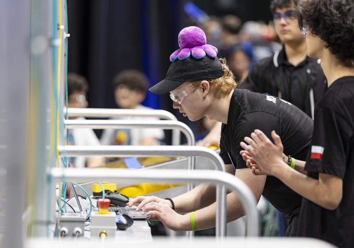 Artiom Ryabkov, 20, a member of Kraken, a Polish team from Technikum New Technology, participates in the 2026 FIRST Robotics South Florida Regional Competition at the University of Miami’s Watsco Center on Friday, April 10, 2026, in Coral Gables, Fla. Participants from local school districts, surrounding states, and international teams are competing for an opportunity to earn a spot at the 2026 FIRST World Championship.