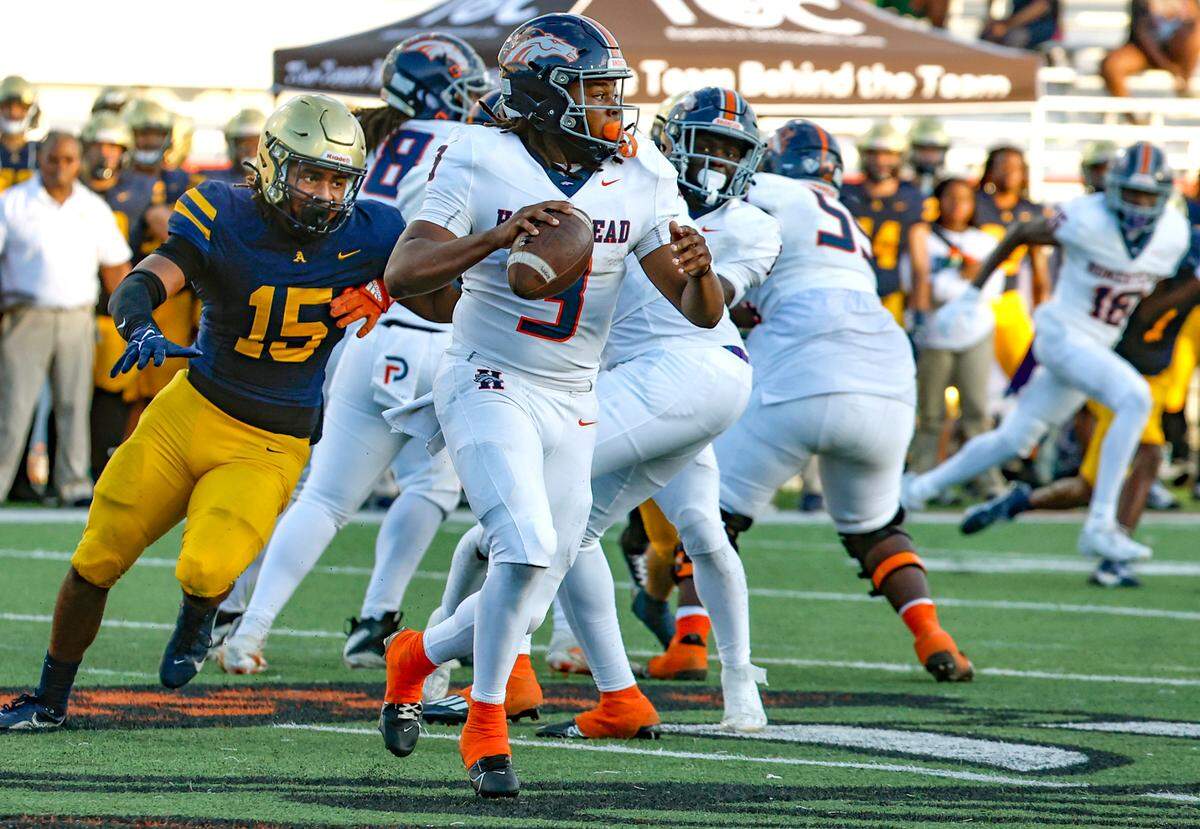 Homestead Broncos quarterback Joshua Townsend (3) looks to pass in the second half of the game against St. Thomas Aquinas in the Class 3M state championships at Bragg Memorial Stadium in Tallahassee, Florida on Saturday, December 9, 2023.