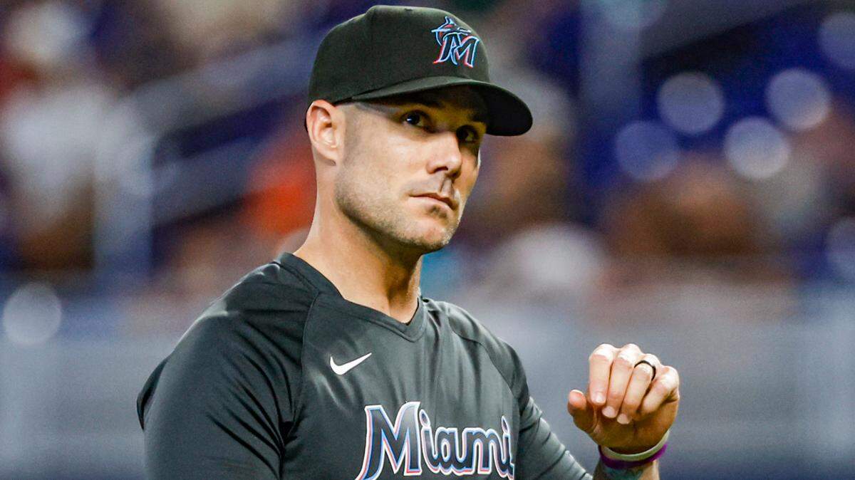 Miami Marlins manager Skip Schumaker (55) walks off the field from the pitcher’s mound during the game against the San Francisco Giants at LoanDepot Park in Miami, Fl on Wednesday, April 19, 2023.