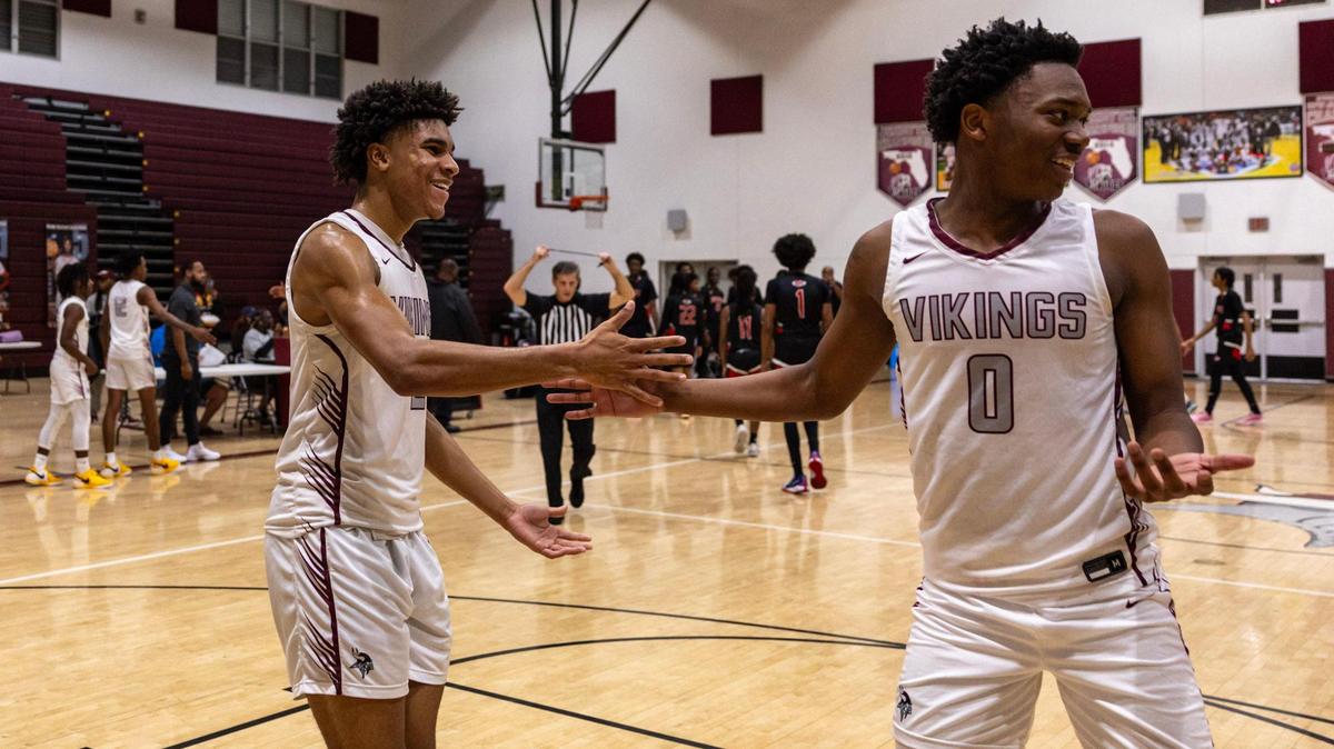 Norland forward Tristan Wilson (2) reacts with teammate Caleb Clarke (0) after defeating Northeast 60-50 during the Regional 4-5A boys basketball semifinal in Miami Gardens, Florida on Tuesday, February 20, 2024.