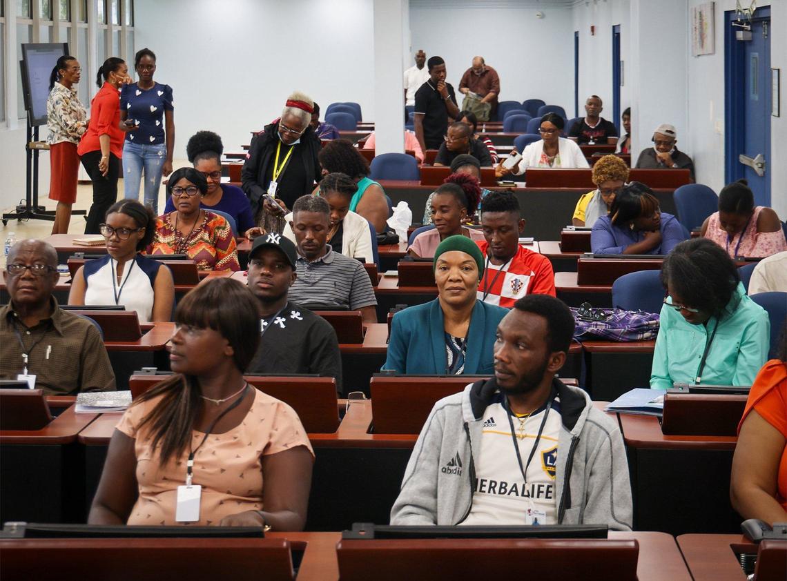 Drelette Bernabe, center, is among 40 adult Haitian students attend a computer class at the Pierre Toussaint Leadership and Learning Center in the Little Haiti neighborhood of Miami, Florida, to learn digital skills and ease the pathway into employment on Wednesday, September 25, 2024.