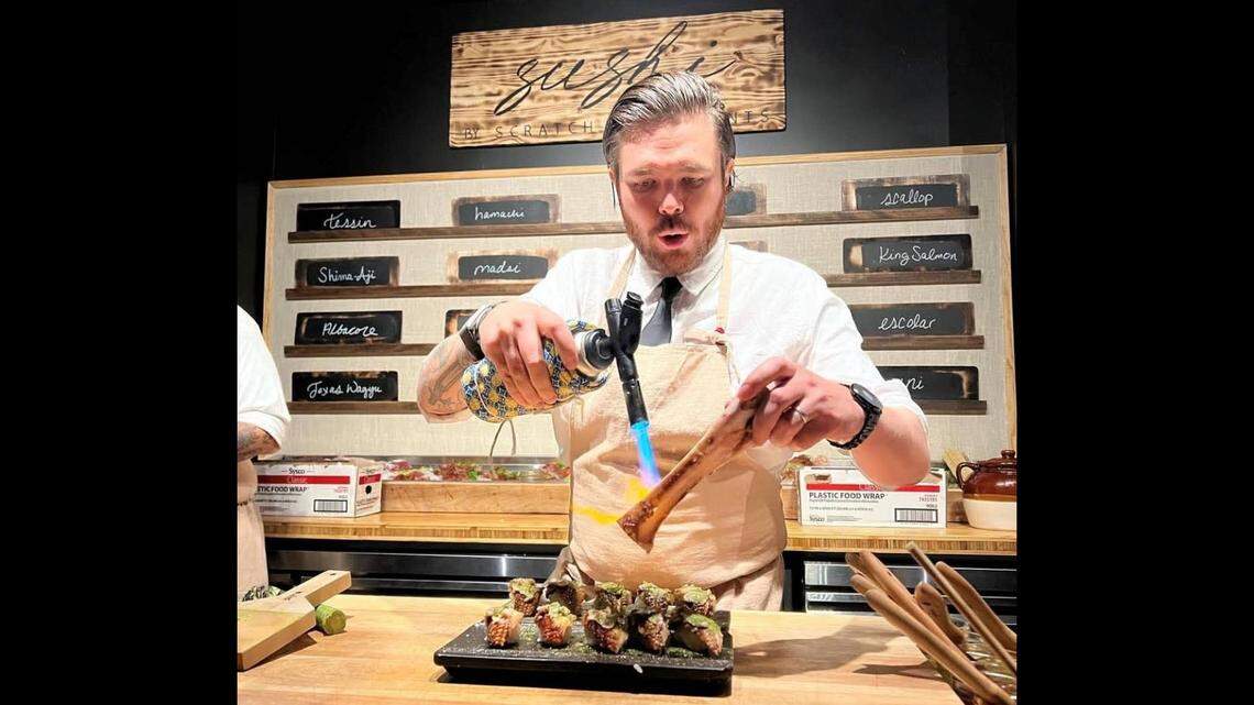Chef Phillip Frankland Lee, owner of two Michelin-starred restaurants in California, melts bone marrow onto Japanese eel as part of the omakase menu at his new Sushi by Scratch restaurant in Coconut Grove.