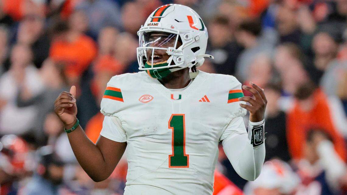 Miami Hurricanes quarterback Cam Ward (1) gestures on the field in the second half NCAA football game against the Syracuse Orange in the JMA Wireless Dome at Syracuse University, Syracuse, New York on Saturday, November 30, 2024.