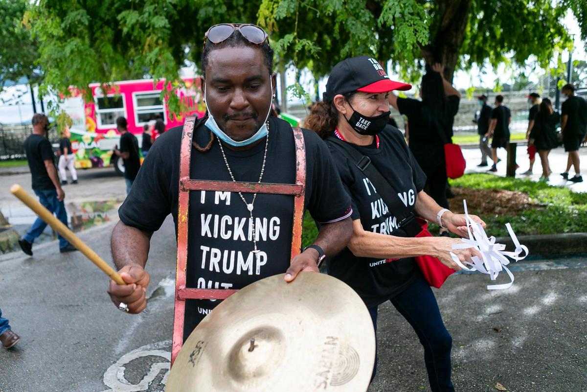 Canvassers organized by Unite Here make their way toward their cars to fan out across South Florida to knock on voters’ doors during their Take Back 2020 event in the Betty T. Ferguson Recreational Complex in Miami Gardens on Saturday, October 31, 2020.