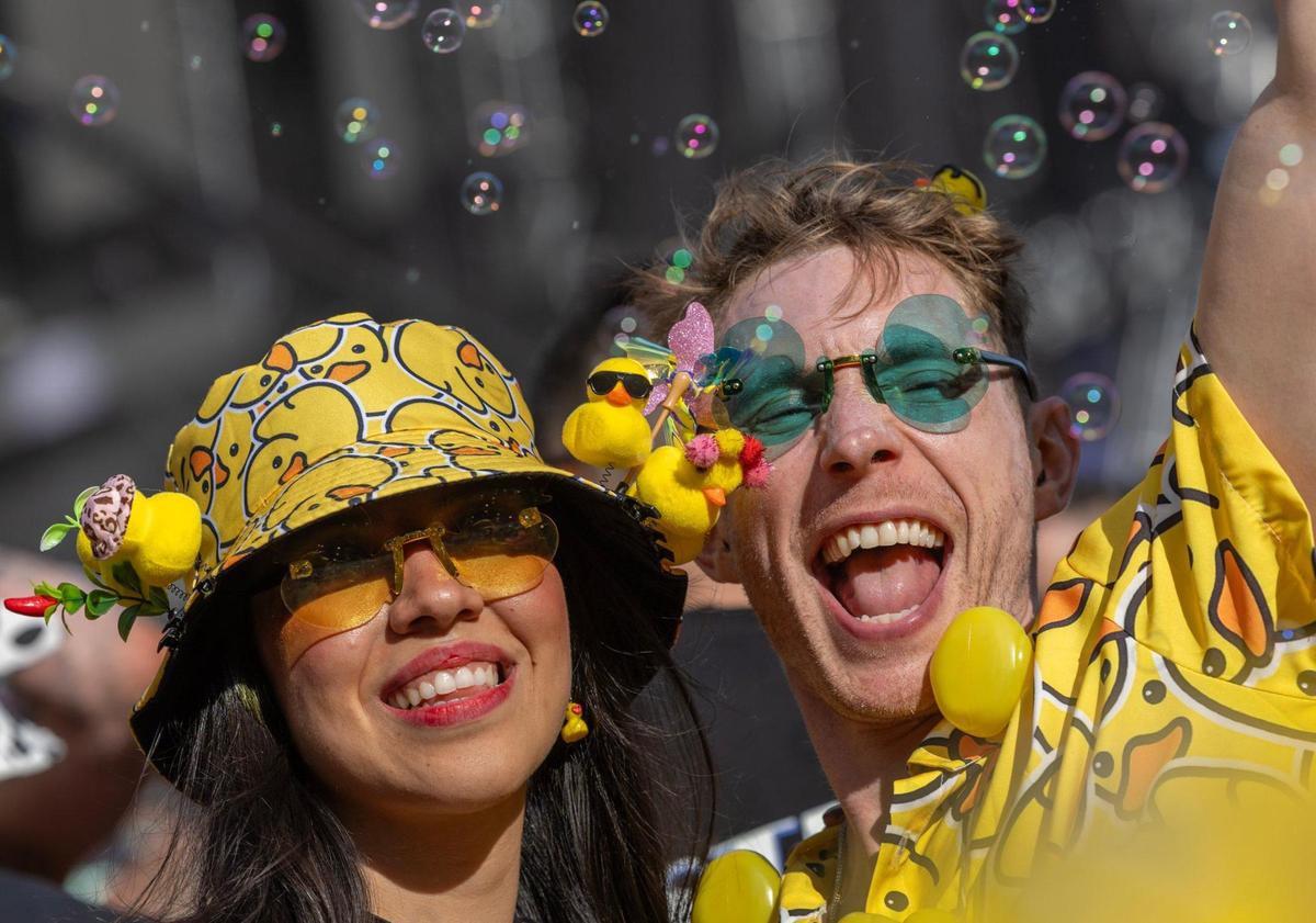 Salma Lopez and Richard Gornall react to the music performance at Ultra Music Festival’s 25th anniversary at Bayfront Park, in Miami, Florida, on Friday, March 28, 2025.