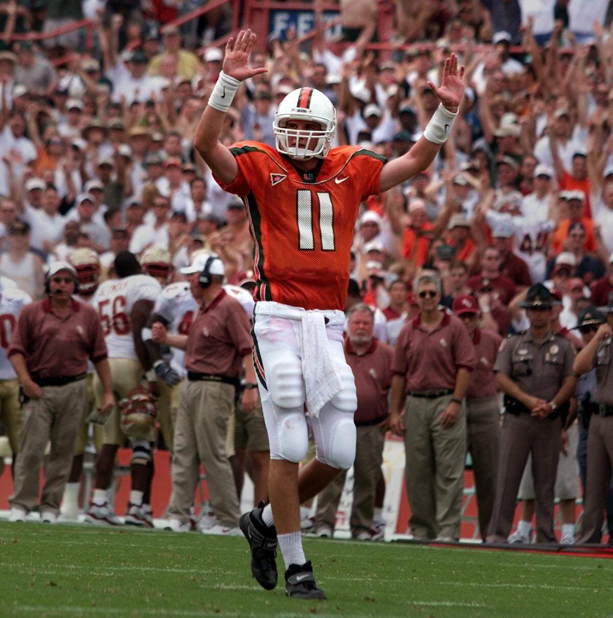 In 2000, UM defeated No, 1 Florida State 27-24 at the Orange Bowl. Canes QB Ken Dorsey and the crowd celebrate DJ Williams’ one-yard TD run in the second quarter that put UM up 14-0.