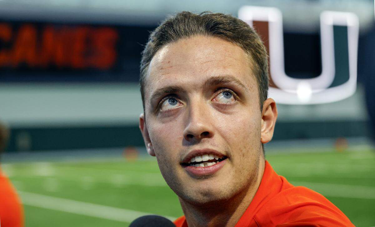 Miami Hurricanes quarterback Carson Beck speaks to reporters during Media Day at the Carol Soffer Indoor Practice Facility in Coral Gables, Florida, on Wednesday, July 30, 2025.