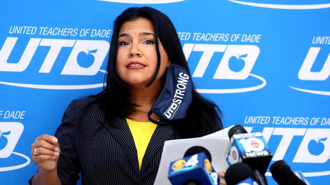 United Teachers of Dade President Karla Hernandez-Mats, joined by members of the Broward Teachers Union, speaks during a press conference about the health and safety gaps that need to be addressed before the reopening of schools in both counties. They gathered at the UTD headquarters in Miami Springs on Wednesday, Sept. 16, 2020.