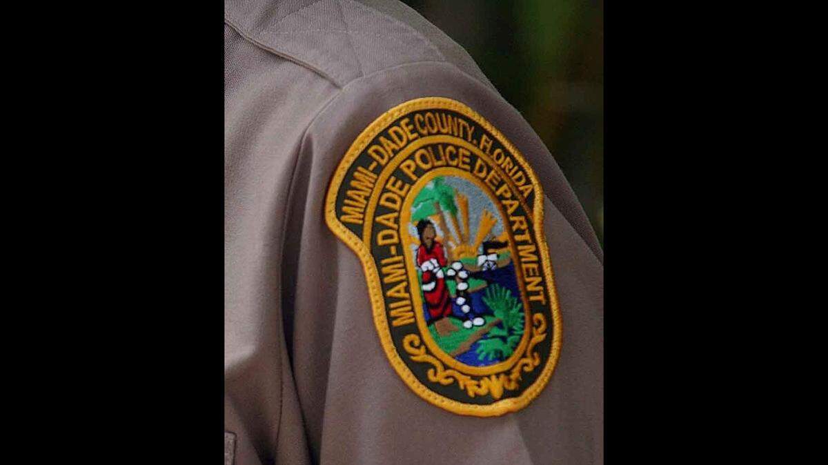A Miami-Dade police badge.