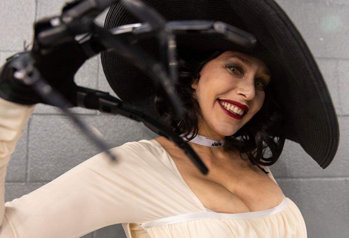 Stephanie Myers, 49, cosplays as Lady Dimitrescu from Resident Evil Village during Florida Supercon 2023 on Friday, June 30, 2023, in Miami Beach, Fla.
