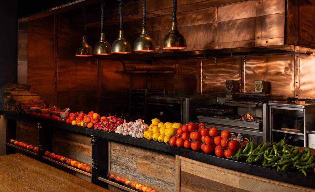 The style of the new Naked Tomato aims to incorporate the look of a kitchen, market and dining room.