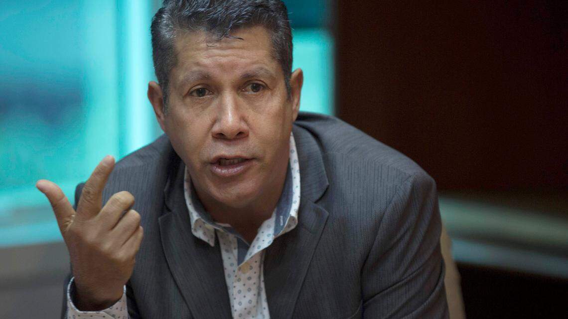 In this Feb. 20, 2018, file photo, independent presidential candidate Henri Falcón, a former governor and former aide to the late President Hugo Chávez, speaks to the press in Caracas, Venezuela. Falcón is running against Venezuelan leader Nicolás Maduro. Falcón said Monday, April 2, on Twitter that a congressman campaigning with him in a poor neighborhood was struck by a man wearing steel knuckles, sending him to the hospital with a serious head injury.
