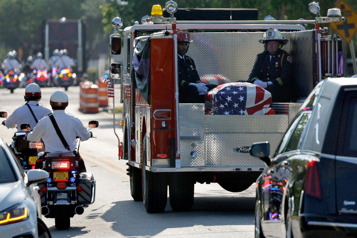 The funeral procession for Broward Sheriff Fire Rescue Battalion Chief Terryson Jackson leaves the L.C. Poitier Funeral Home in Pompano Beach on Friday, Sept. 8, 2023. Jackson died in a helicopter crash on Monday, Aug. 28, when he and two BSFR colleagues were returning to the airport after responding to an emergency call. (Amy Beth Bennett / South Florida Sun Sentinel)