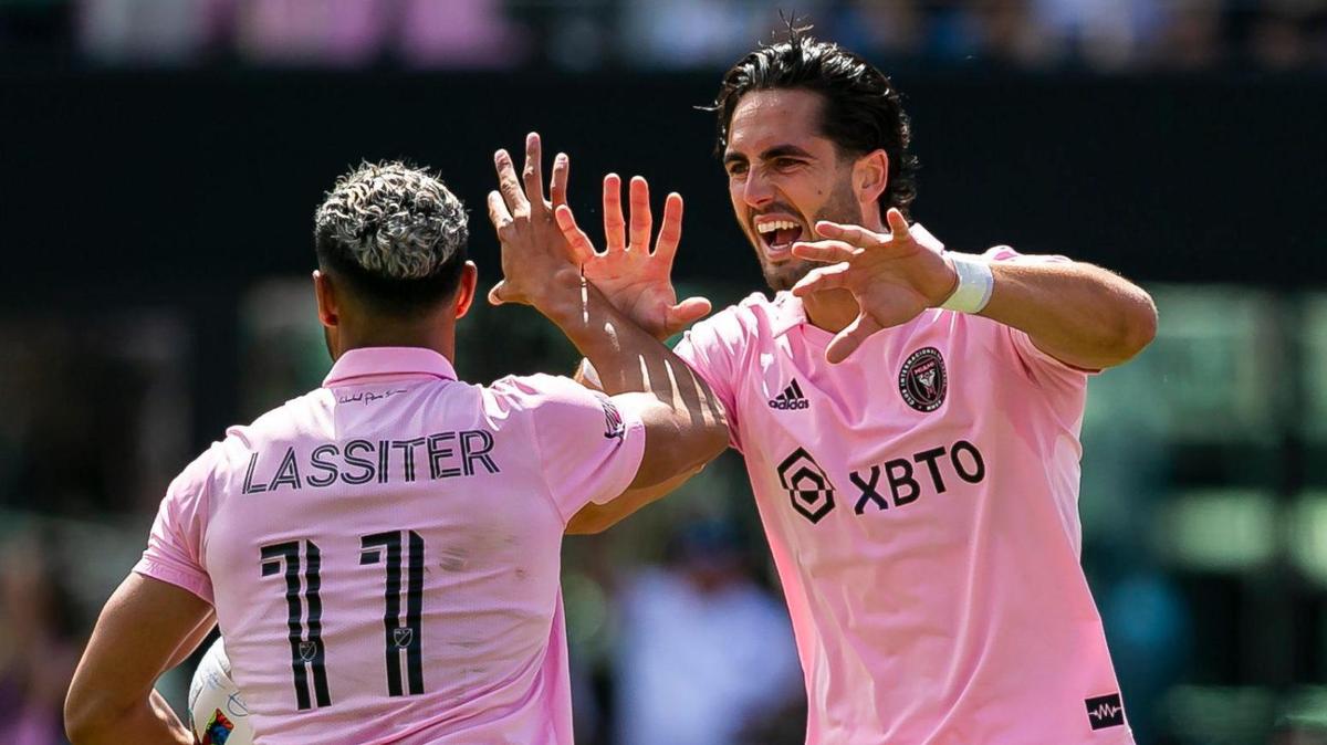 Inter Miami forwards Ariel Lassiter (11) and Leonardo Campana (9) celebrate after scoring a goal against New England Revolution during the first half of their MLS soccer match at DRV PNK Stadium on Saturday, April 9, 2022, in Fort Lauderdale, Florida.
