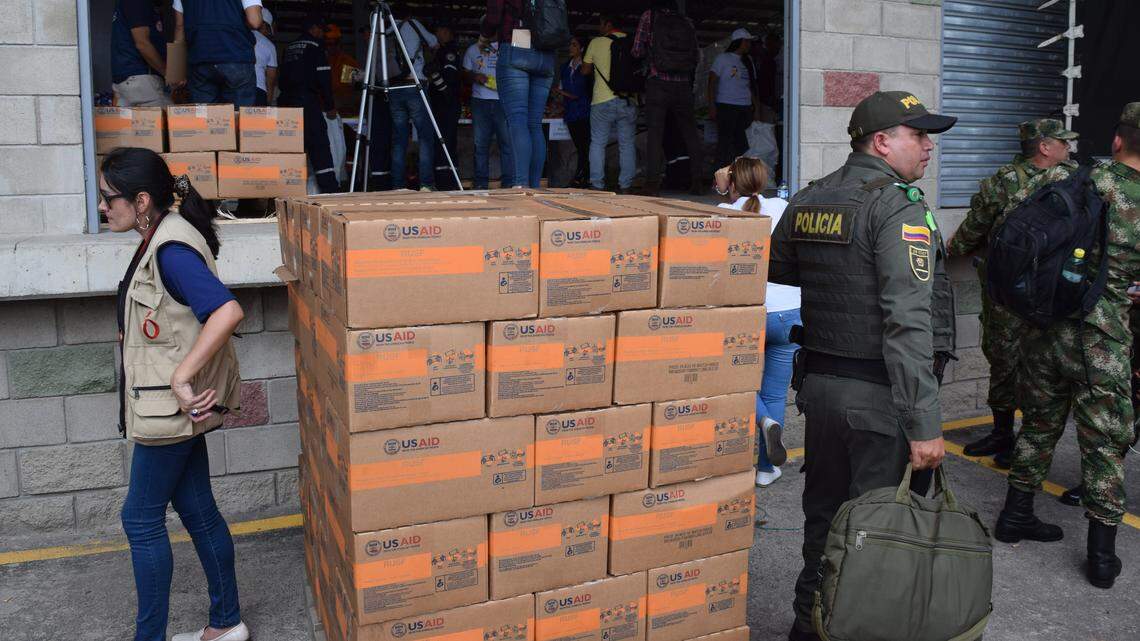 U.S. aid at a loading dock in Cucuta, Colombia, awaits to be delivered in Venezuela. Venezuelan leader Nicolas Maduro has said he won’t let the food and medicine enter the country, fearing that it’s a pretext for a coup or armed invasion.