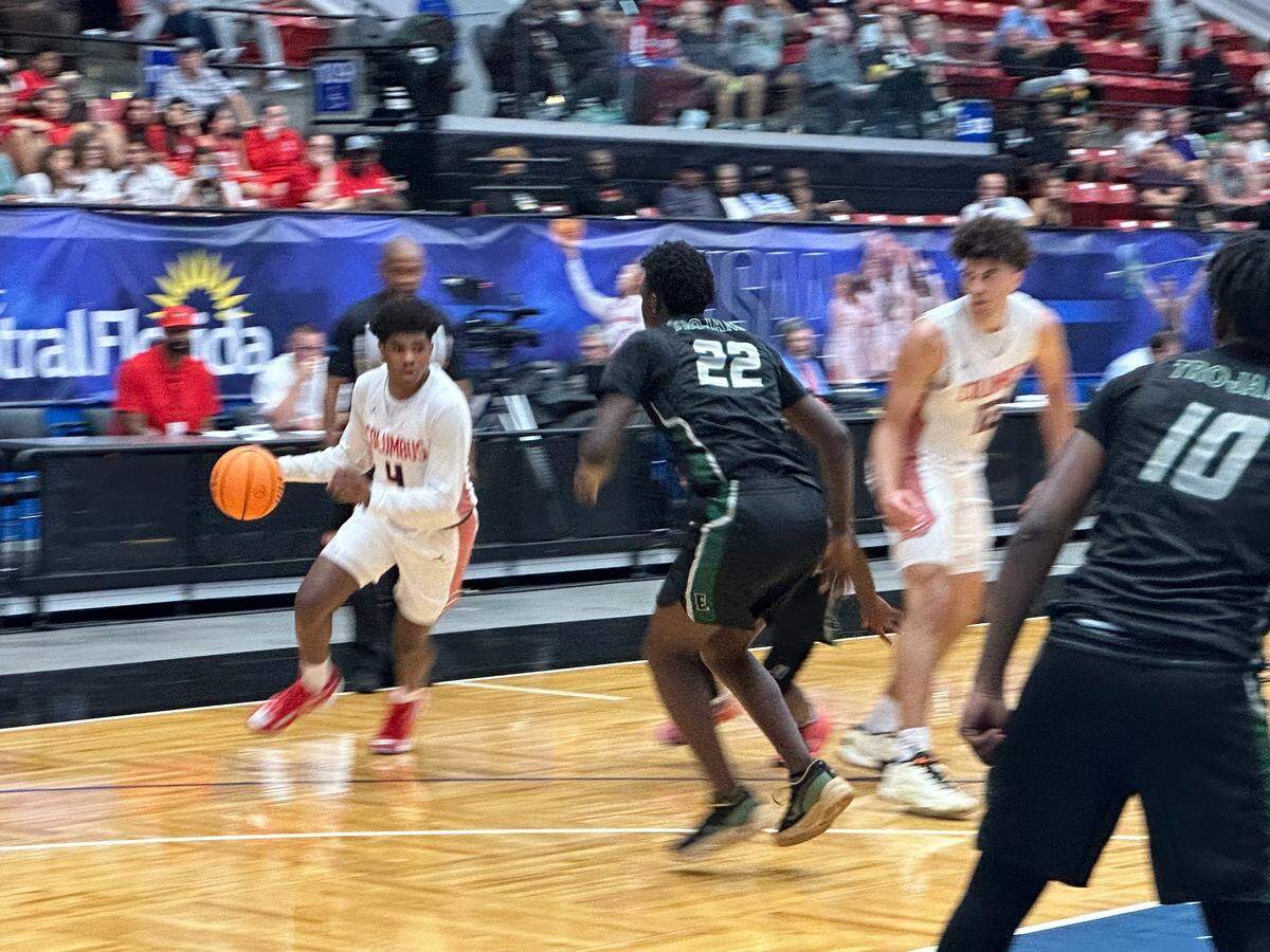 Columbus guard Jase Richardson turns the corner to drive to the rim during Friday’s victory over Orlando Evans in a Class 7A state semifinal at the RP Funding Center in Lakeland, Fla.