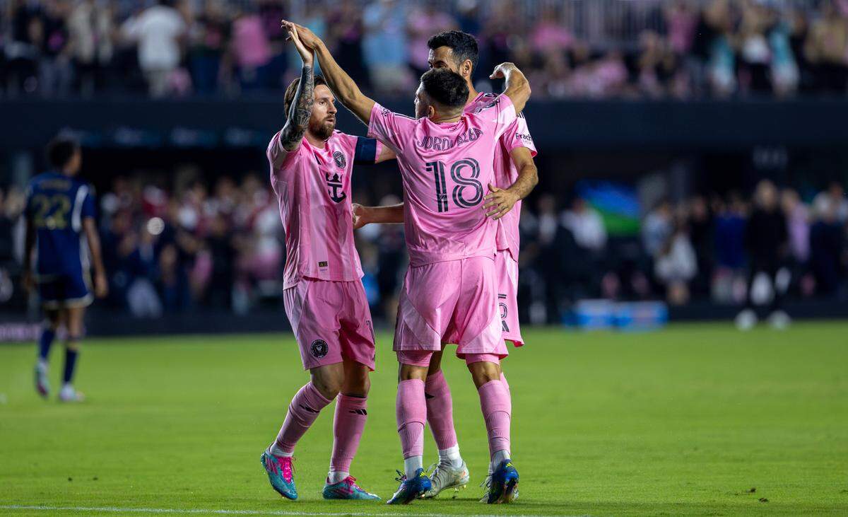 Inter Miami defender Jordi Alba (18) celebrates with teammates Lionel Messi (10) and Sergio Busquets (5) after scoring in the first half of the Concacaf Champions Cup semifinal against the Vancouver Whitecaps at Chase Stadium on Wednesday, April 30, 2025, in Fort Lauderdale, Fla.