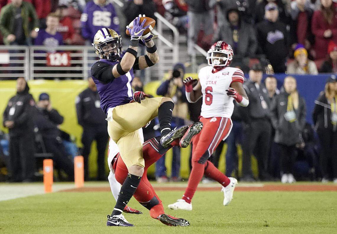 Washington defensive back Byron Murphy, left, intercepts a pass against Utah during the second half of the Pac-12 Conference championship NCAA college football game in Santa Clara, Calif., Friday, Nov. 30, 2018.
